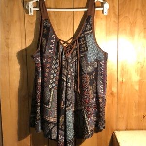 Blouse with leather straps and front tie